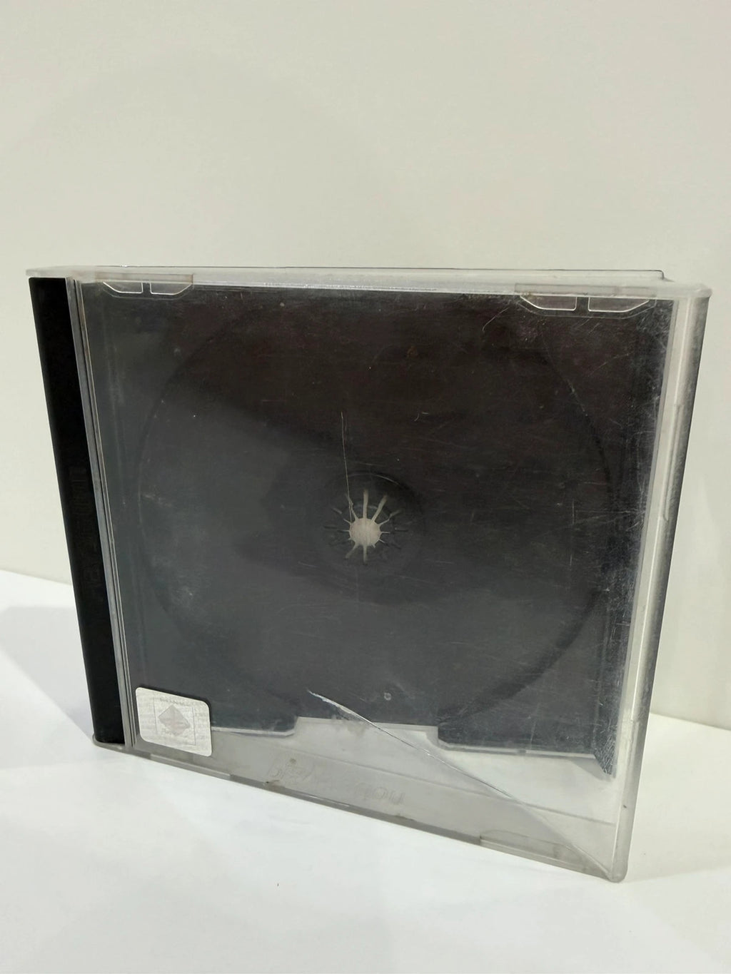 Tetris Plus PS1 video game disc and case with visible crack, no front inlay.