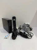 Nintendo black Wii console bundle with official accessories and Wii2HDMI adapter.