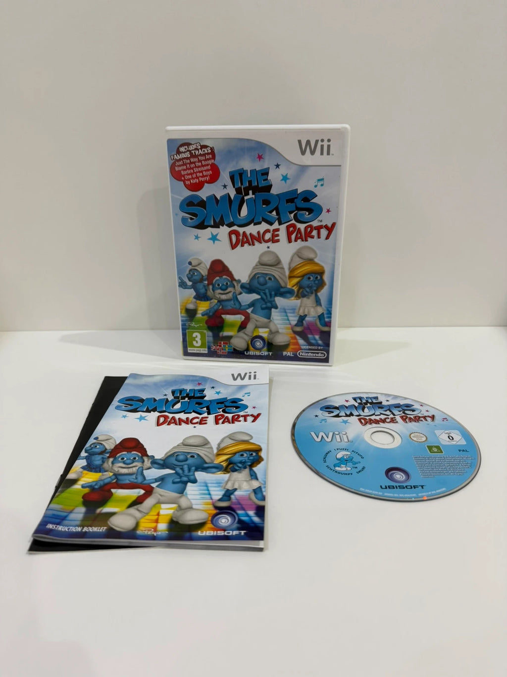 The Smurfs Dance Party Nintendo Wii game complete with manual and colorful cover art.