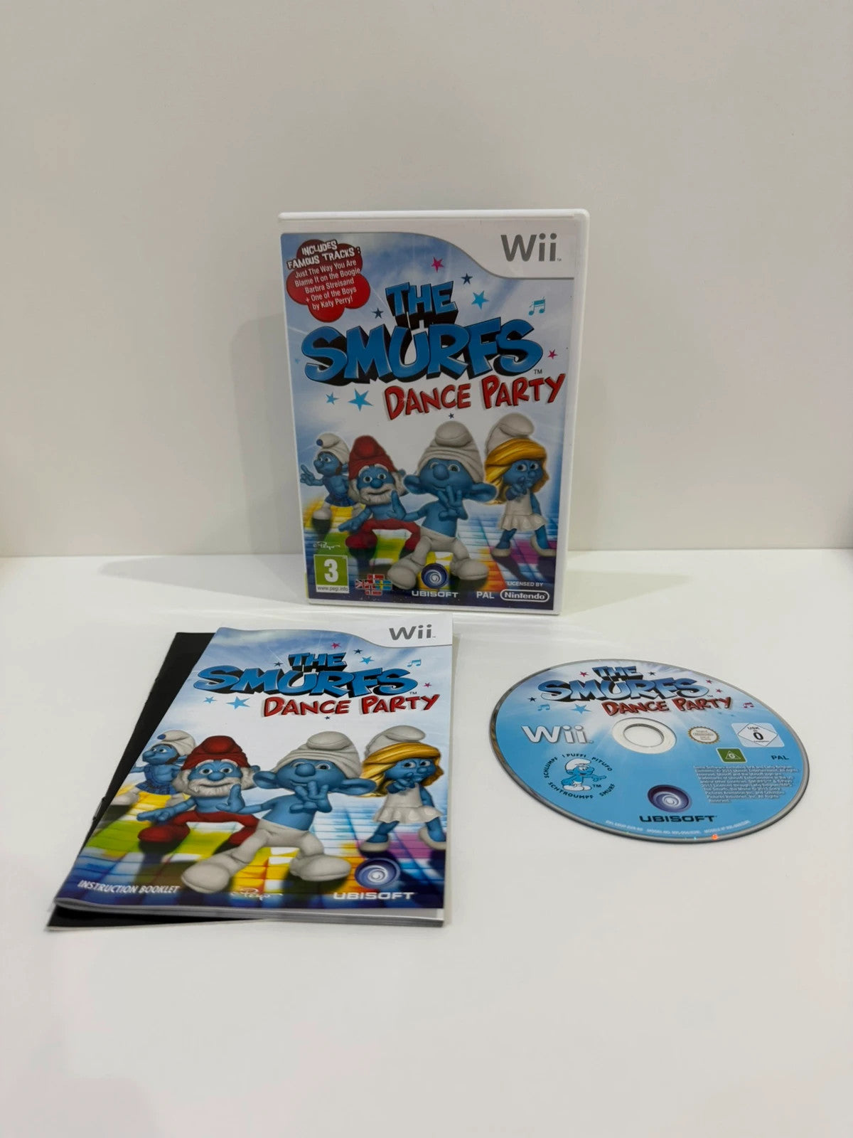 The Smurfs Dance Party Nintendo Wii game complete with manual and colorful cover art.
