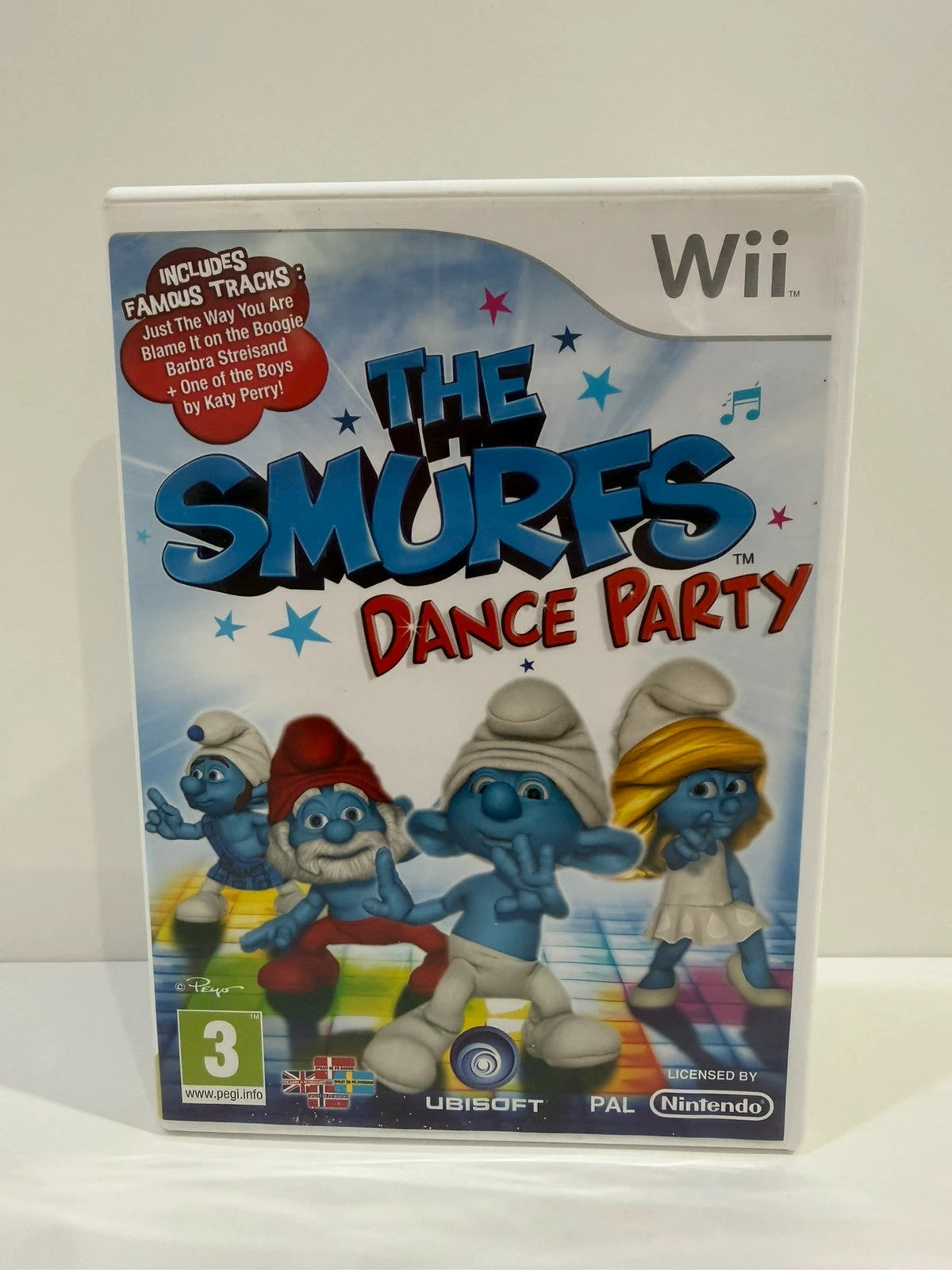 The Smurfs Dance Party Nintendo Wii game complete with manual and colorful cover art.