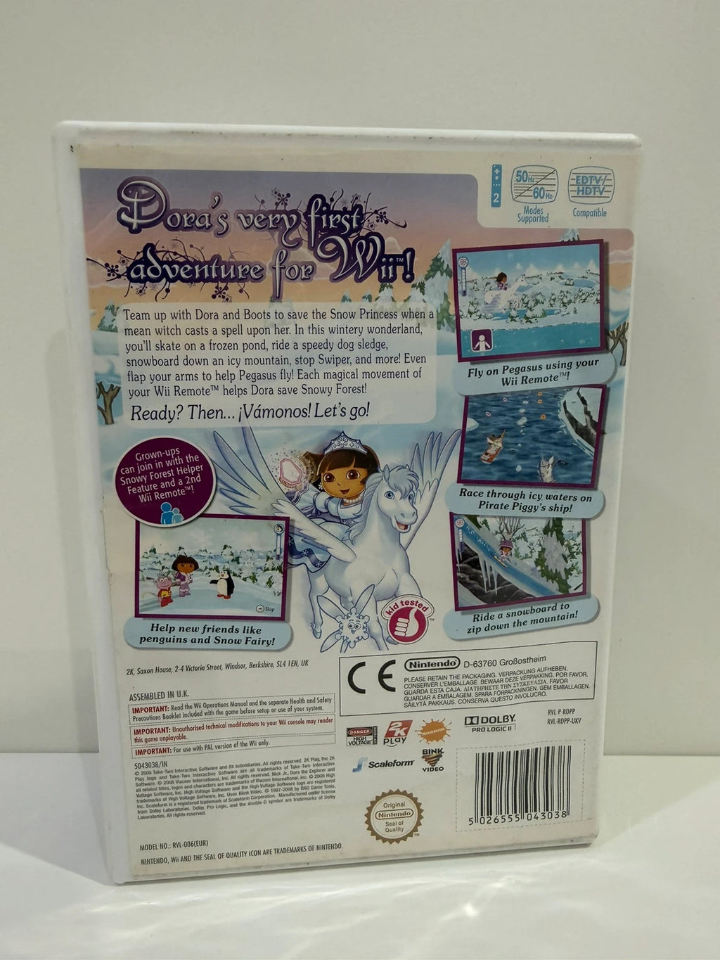 Dora Saves The Snow Princess Nintendo Wii game case with colorful cover art and manual.