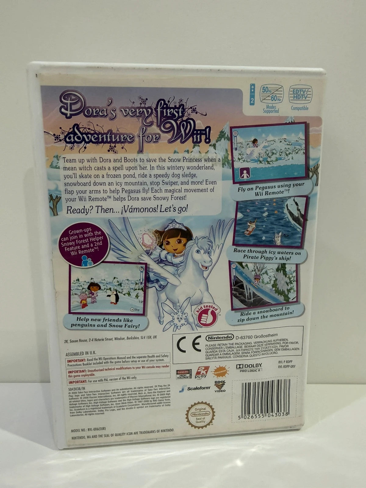 Dora Saves The Snow Princess Nintendo Wii game case with colorful cover art and manual.