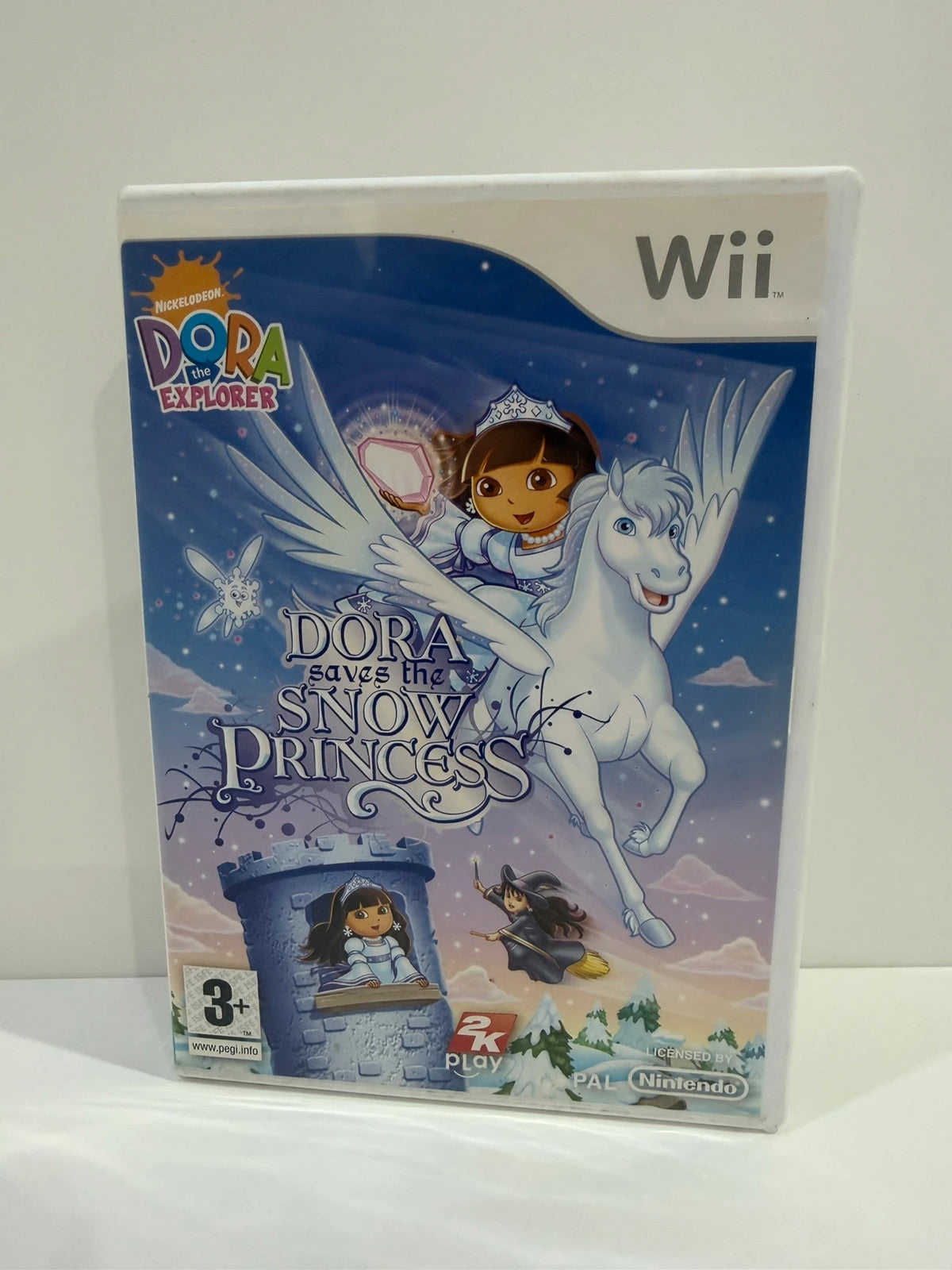 Dora Saves The Snow Princess Nintendo Wii game case with colorful cover art and manual.