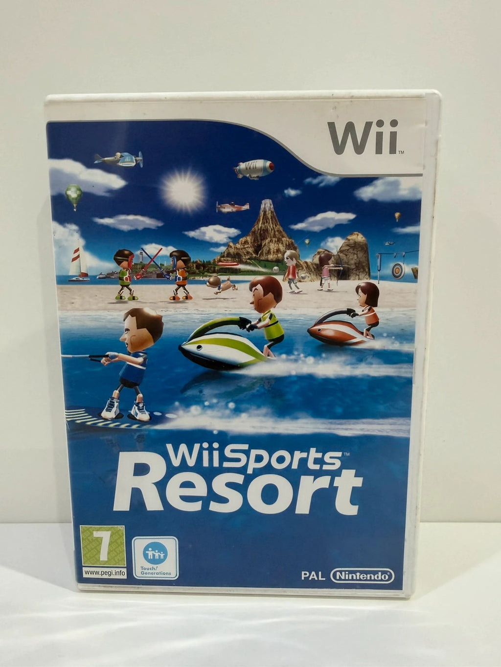 Nintendo Wii Sports Resort game disc with case and manual, very good condition.