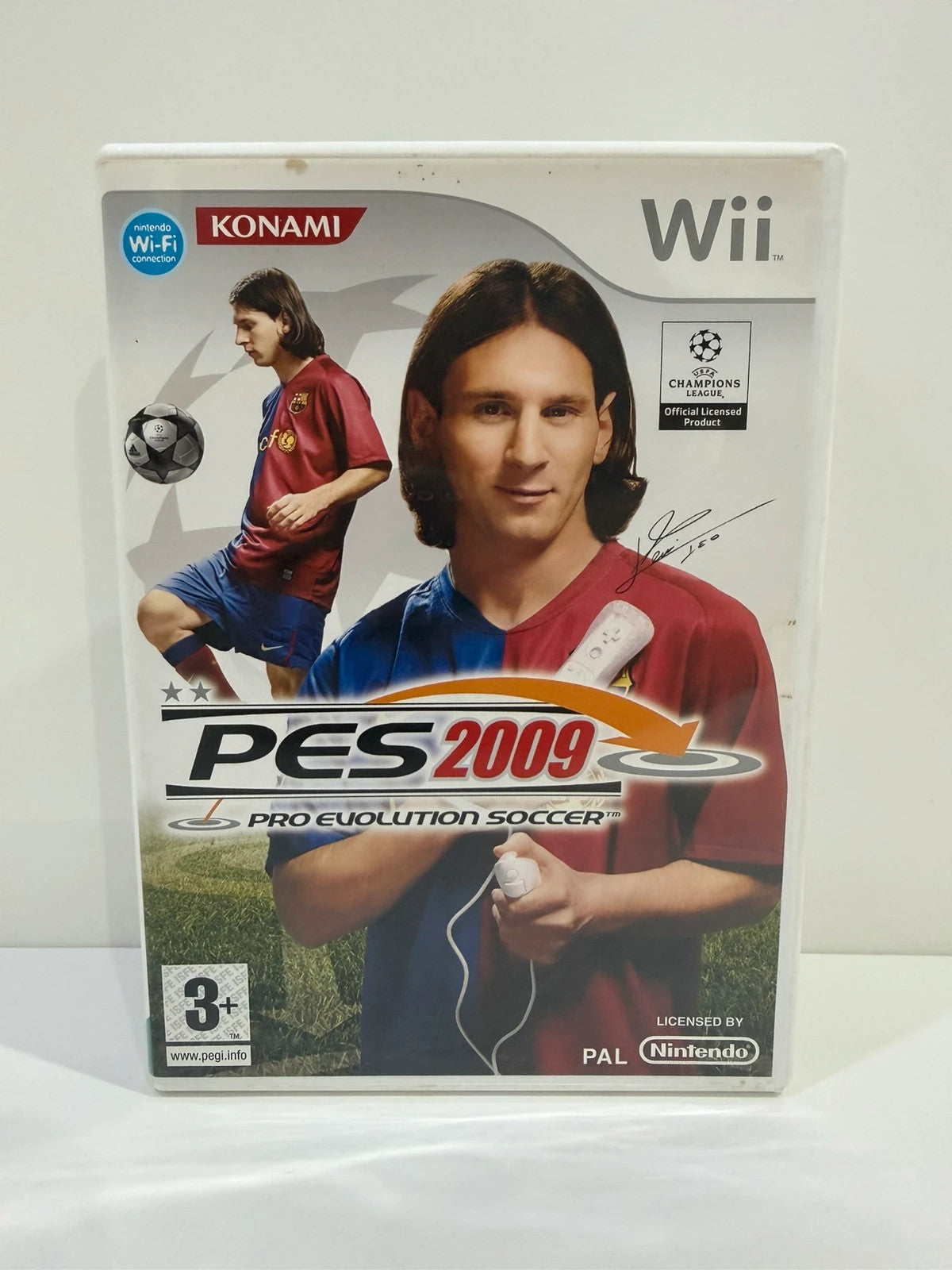 PES 2009 video game for Nintendo Wii, complete with case, manual, and disc.