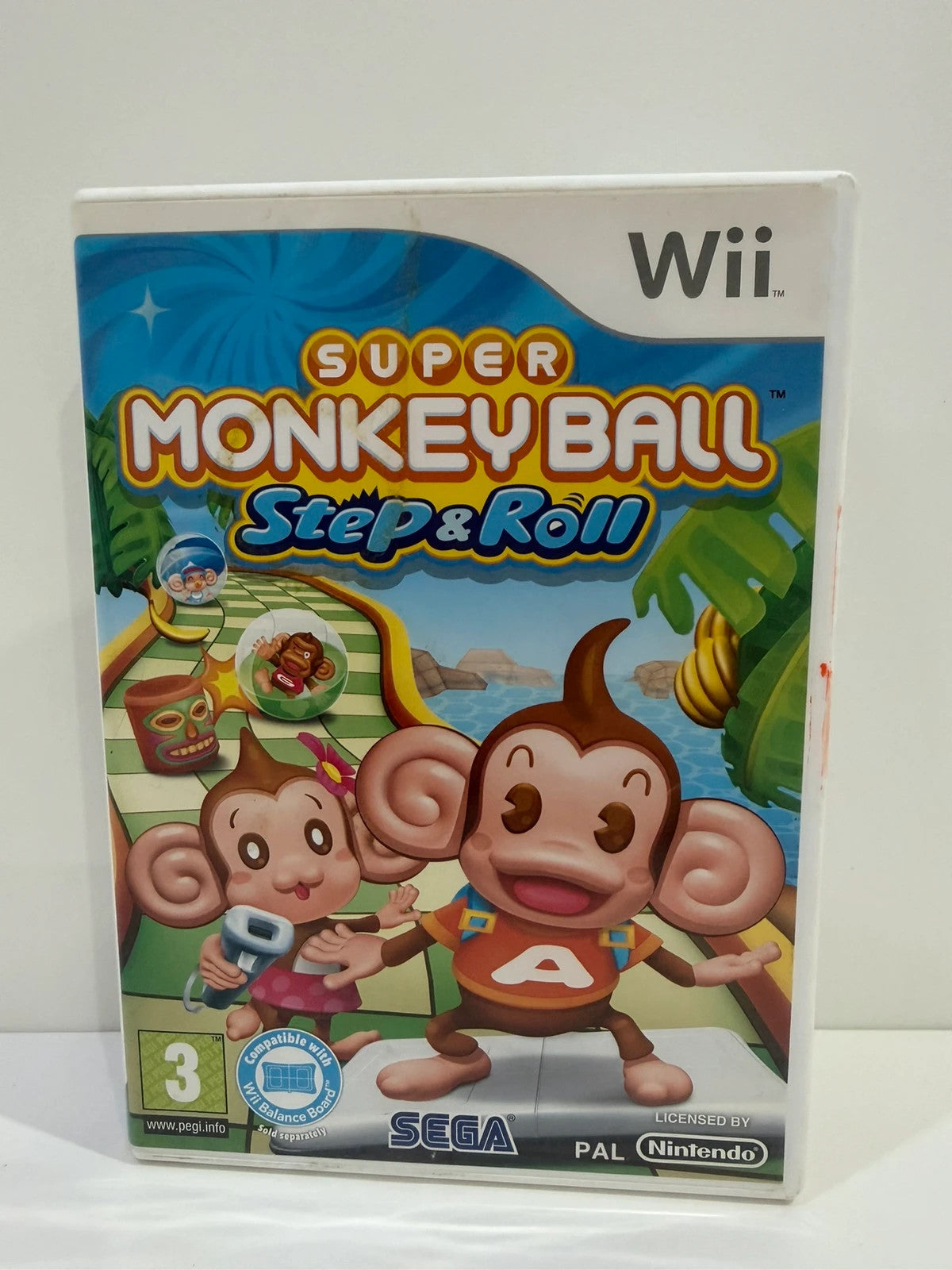 Super Monkey Ball Step & Roll Nintendo Wii game case with manual and disc in very good condition.