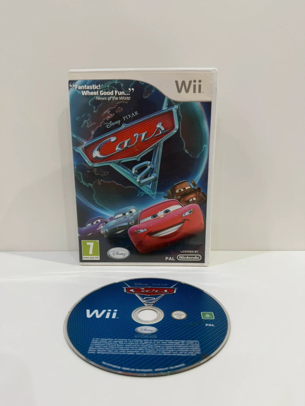 Cars 2 Nintendo Wii game disc and case in very good condition with cover art.