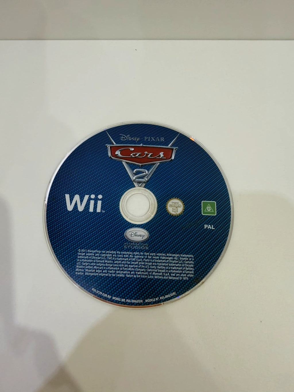 Cars 2 Nintendo Wii game disc and case in very good condition with cover art.