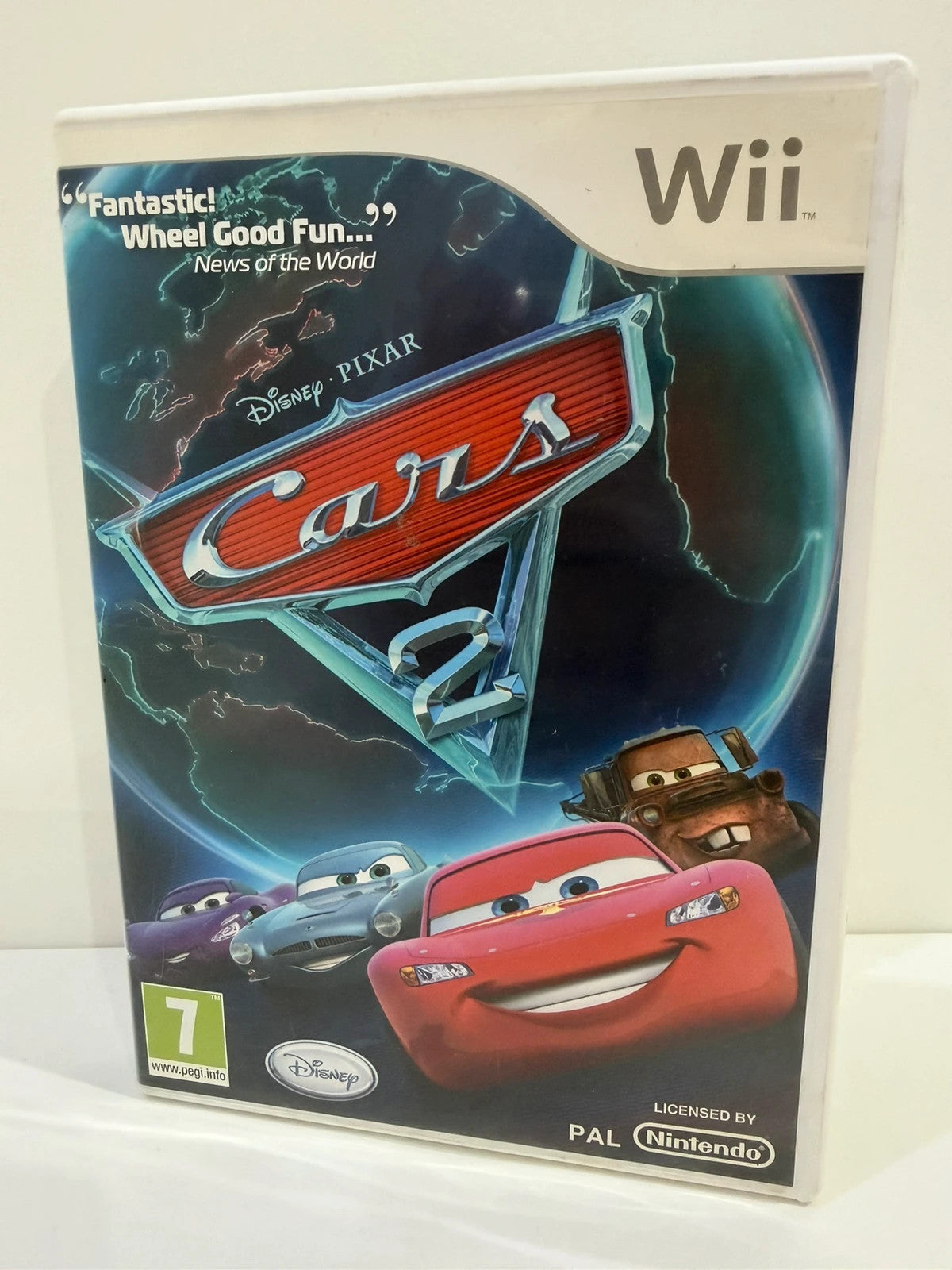 Cars 2 Nintendo Wii game disc and case in very good condition with cover art.