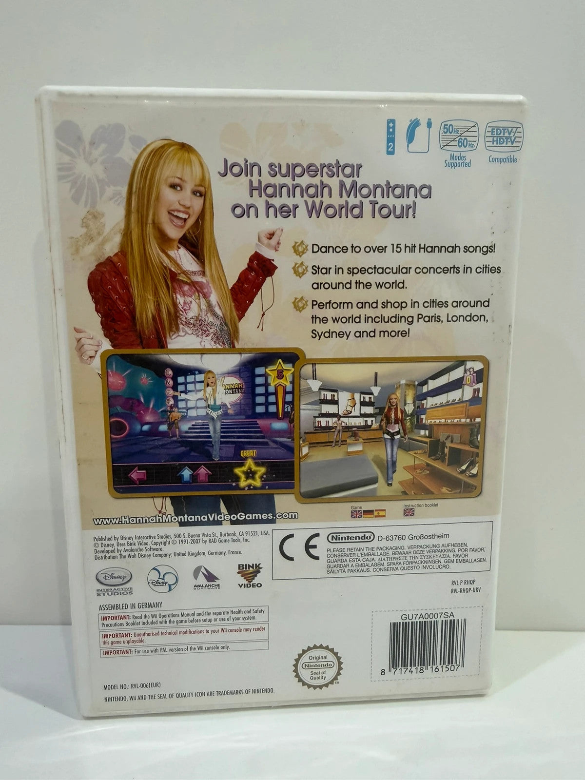 Hannah Montana Spotlight World Tour cream Nintendo Wii game with manual and cover art.