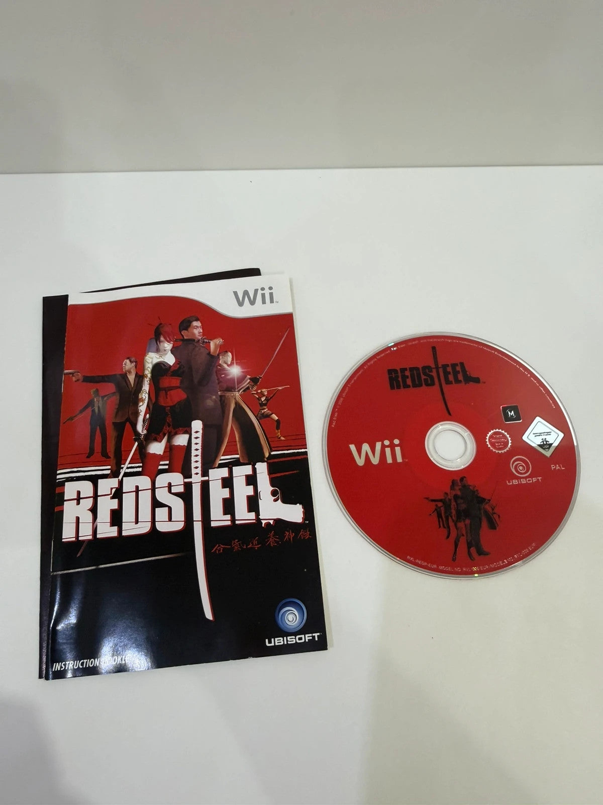 Red Steel Nintendo Wii game red case with manual and disc in very good condition.