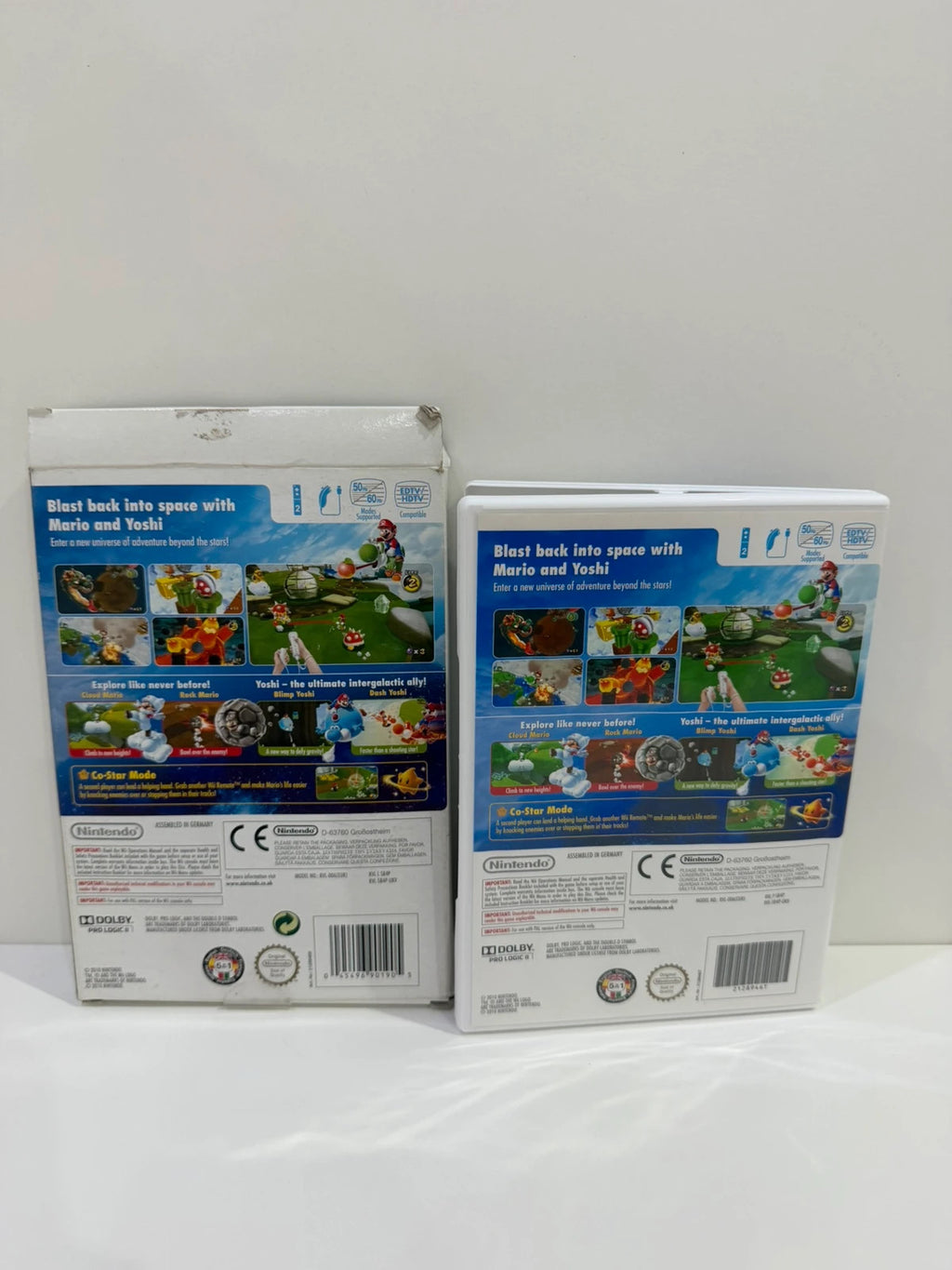 Super Mario Galaxy 2 Nintendo Wii game complete with manual, cardboard sleeve, and sealed DVD.