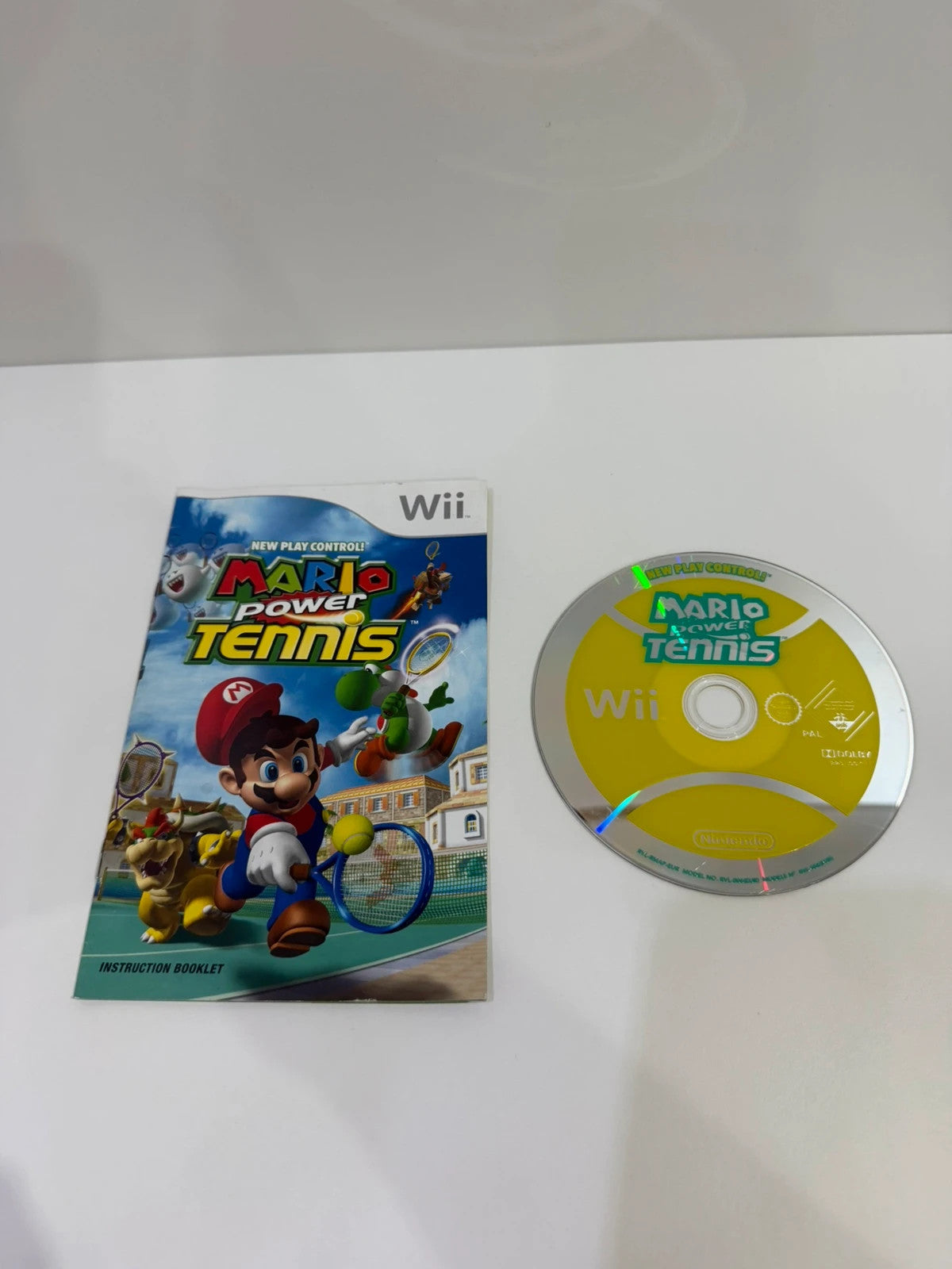 Nintendo Wii Mario Power Tennis game disc with case, cover, and manual included.