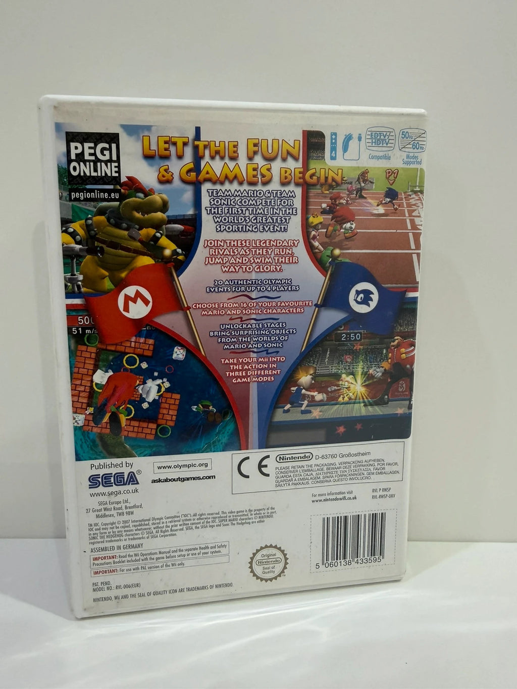 Mario & Sonic at the Olympic Games Nintendo Wii game case with colorful cover art and manual.