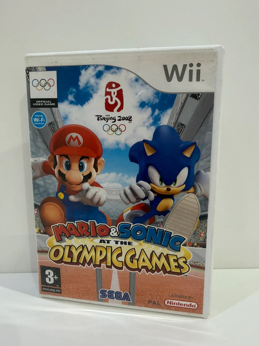 Mario & Sonic at the Olympic Games Nintendo Wii game case with colorful cover art and manual.