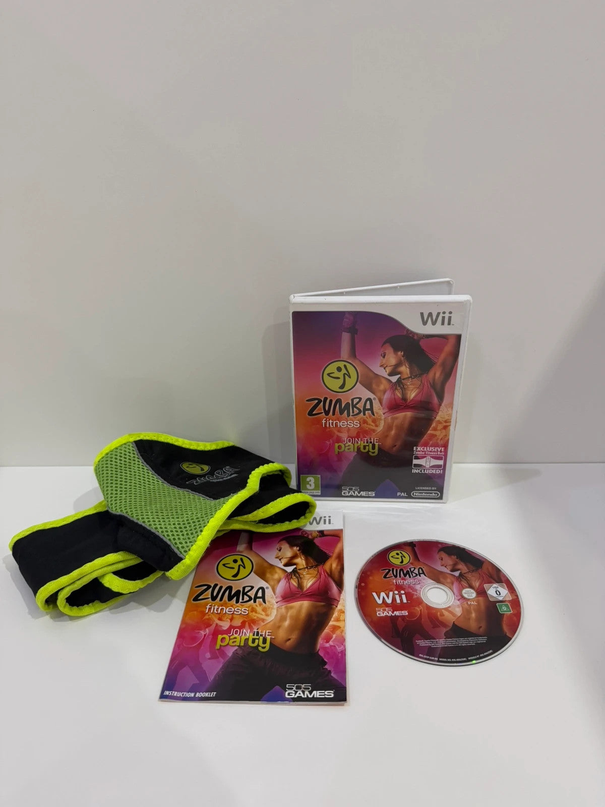 Zumba Fitness video game for Nintendo Wii with manual and fitness belt included.