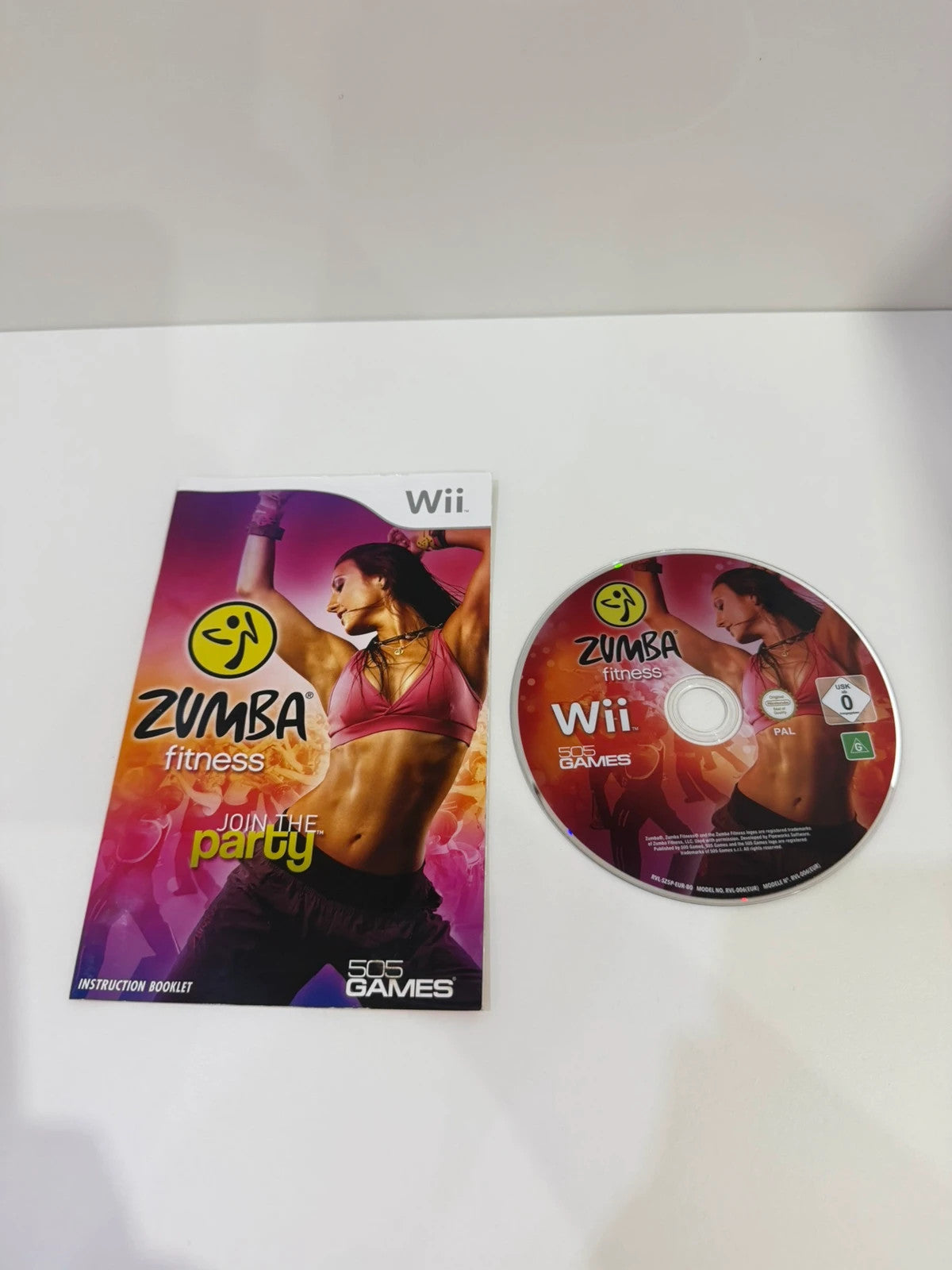 Zumba Fitness video game for Nintendo Wii with manual and fitness belt included.