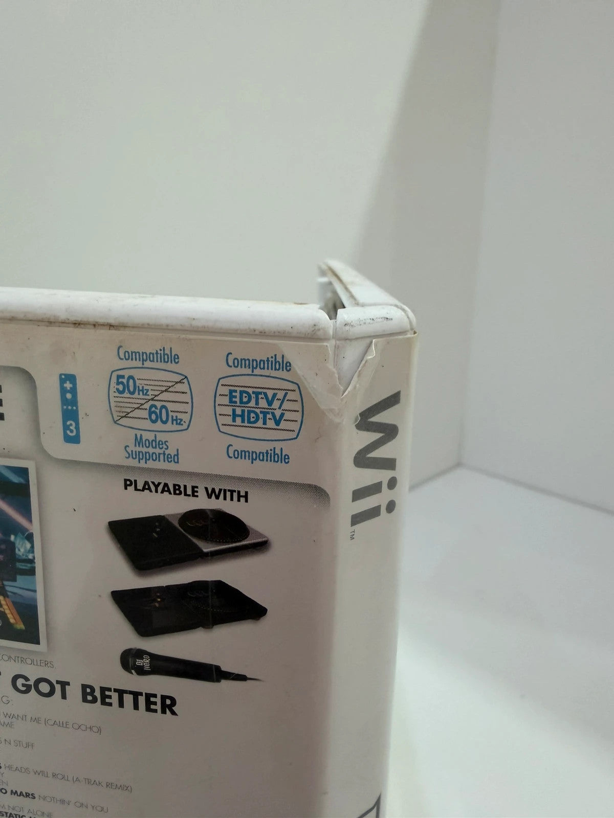 DJ Hero 2 video game for Nintendo Wii with complete manual and damaged case.
