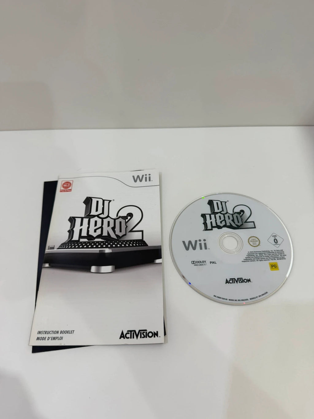 DJ Hero 2 video game for Nintendo Wii with complete manual and damaged case.