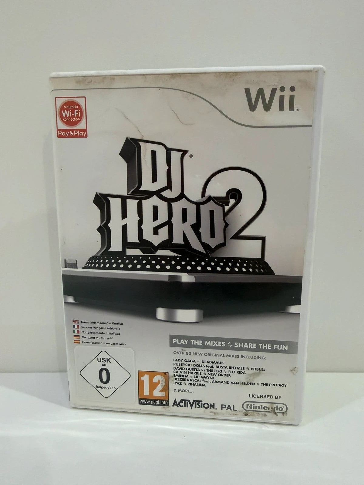DJ Hero 2 video game for Nintendo Wii with complete manual and damaged case.