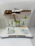 Nintendo Wii Fit Balance Board white with original box, game discs, and booklets.