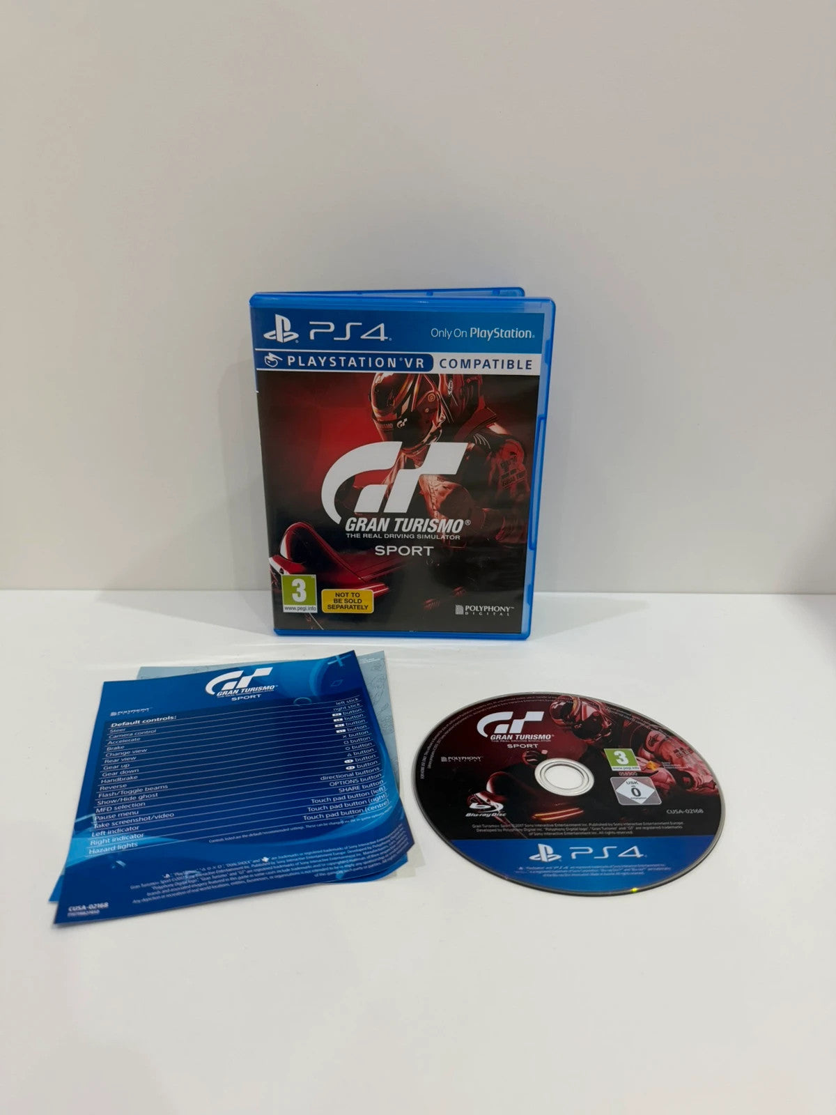 Gran Turismo Sport PS4 game case with disc, manual, and cover in very good condition.