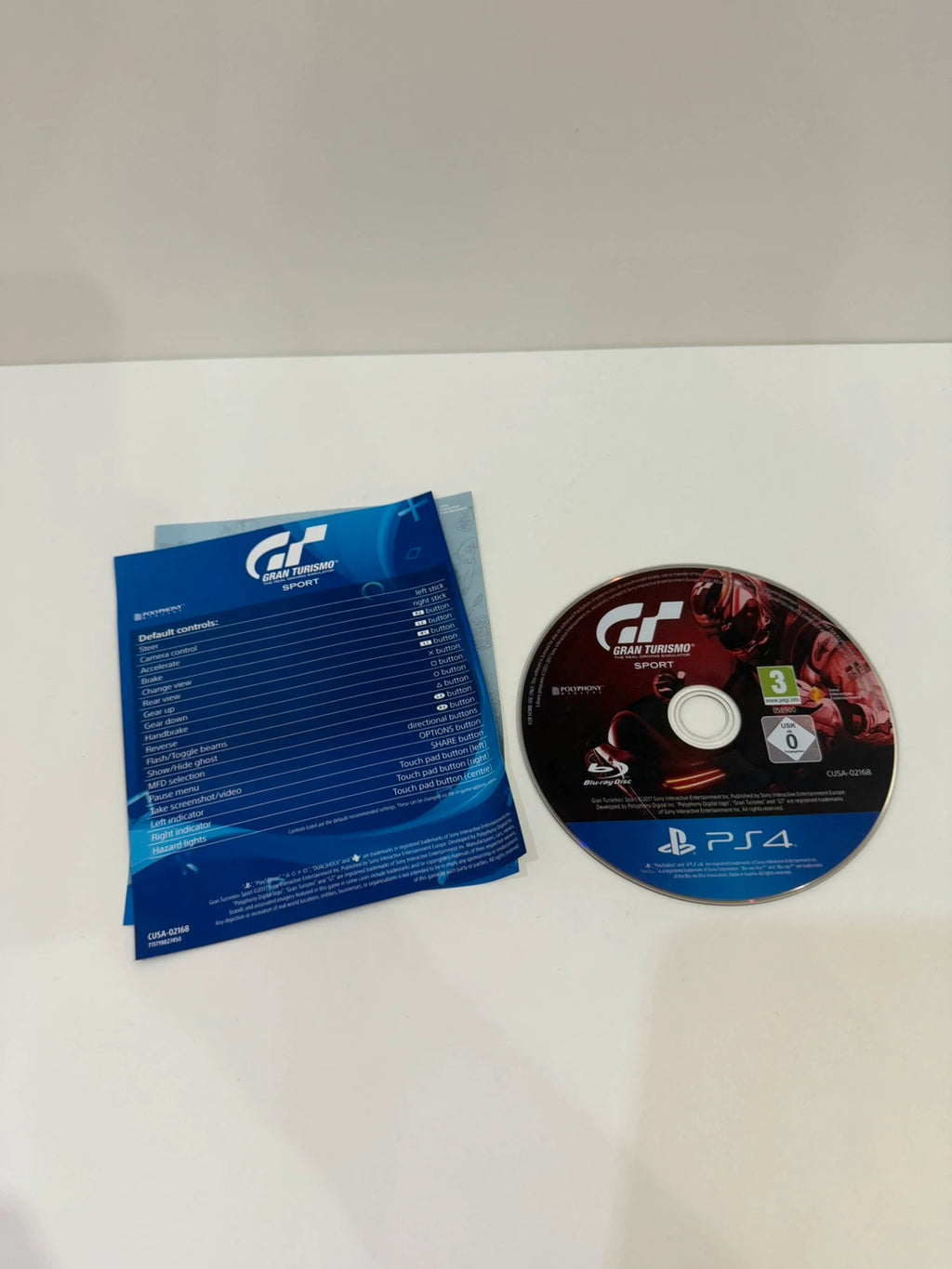 Gran Turismo Sport PS4 game case with disc, manual, and cover in very good condition.