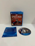 Marvel’s Spider-Man PS4 game case with disc, manual, and vibrant cover art.
