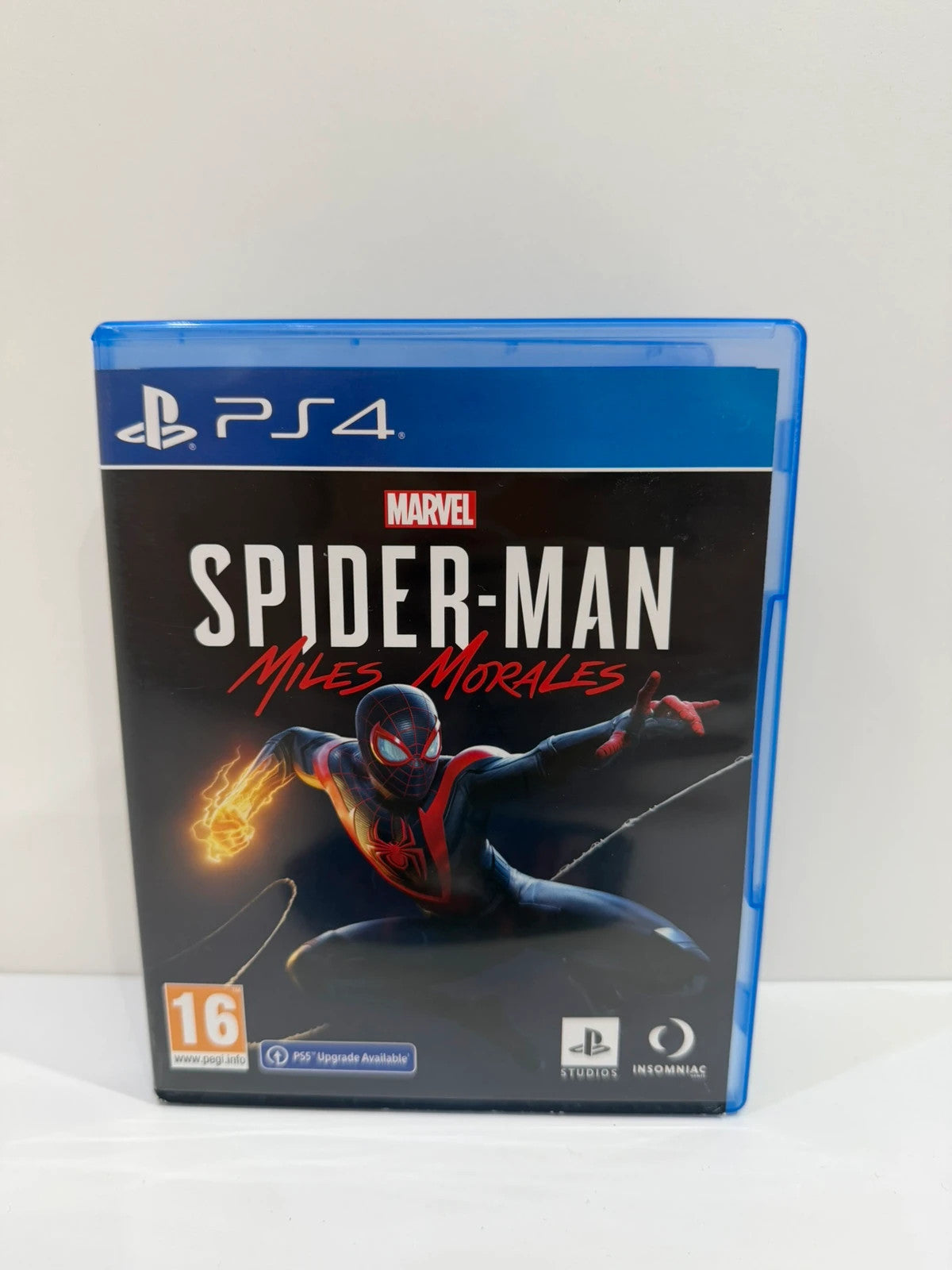 Marvel Spider-Man Miles Morales PS4 game disc with case and cover art.