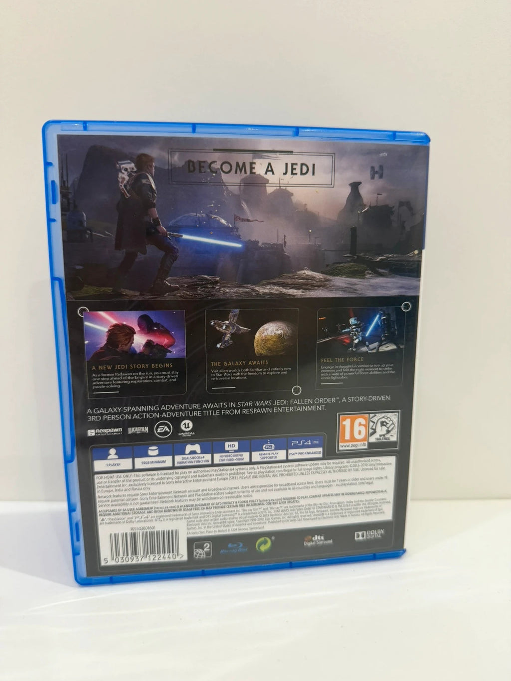 Star Wars Jedi Fallen Order PS4 game disc and case with vibrant cover art.