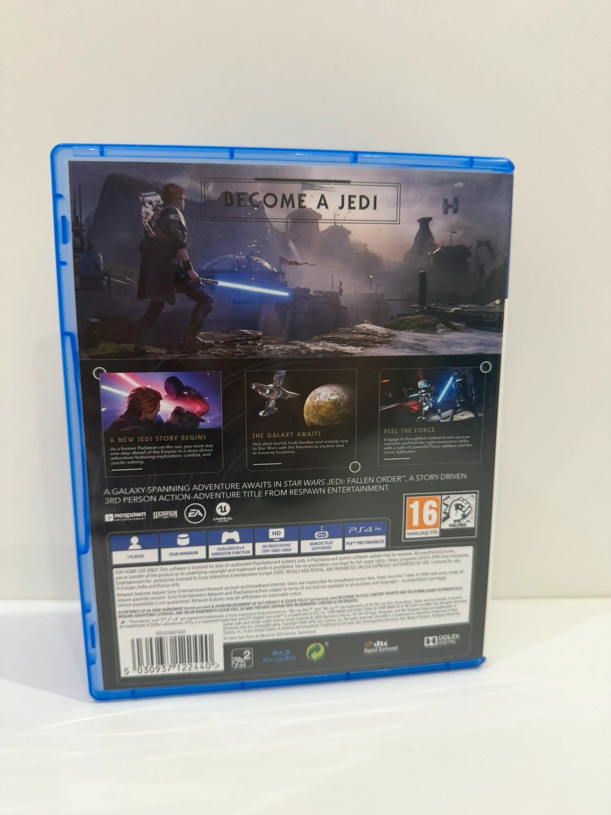 Star Wars Jedi Fallen Order PS4 game disc and case with vibrant cover art.