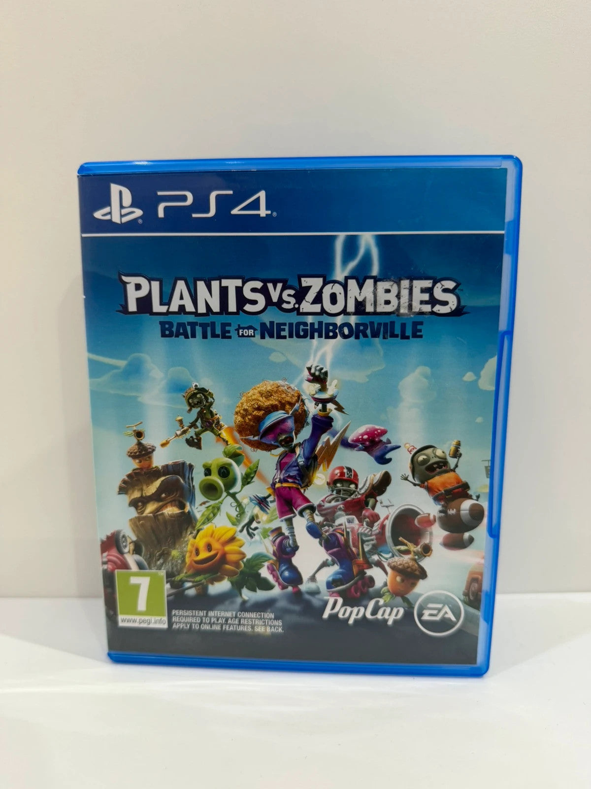 Plants Vs Zombies Battle for Neighborville PS4 game disc and case with vibrant cover art.