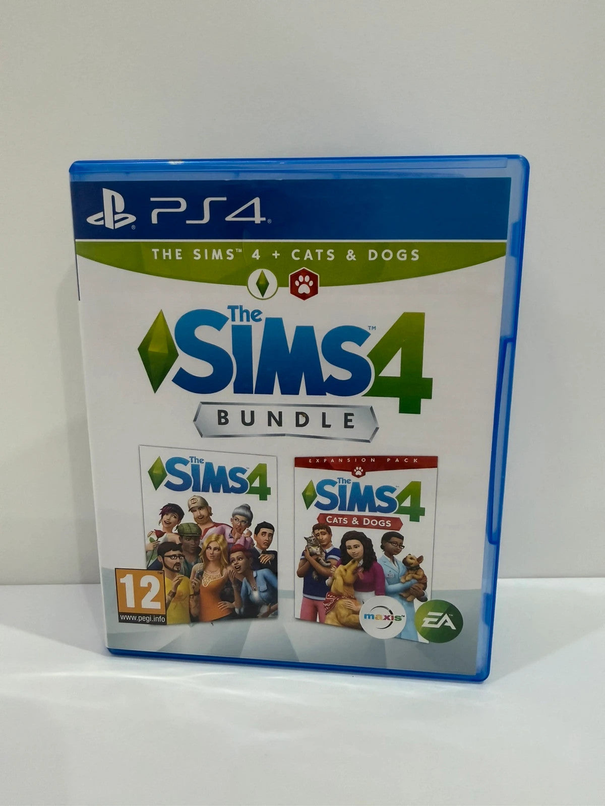 The Sims 4 bundle PS4 game case, disc, and cover in very good condition.