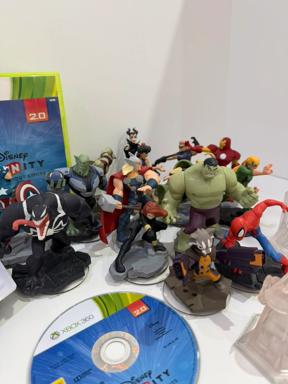 Disney Infinity 2.0 video game bundle for Xbox 360 with character figures and base.