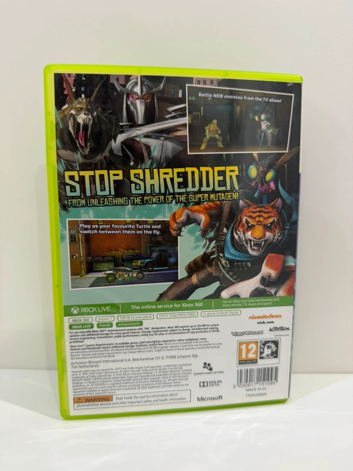 Teenage Mutant Ninja Turtles video game for Xbox 360 with colorful cover art and manual.