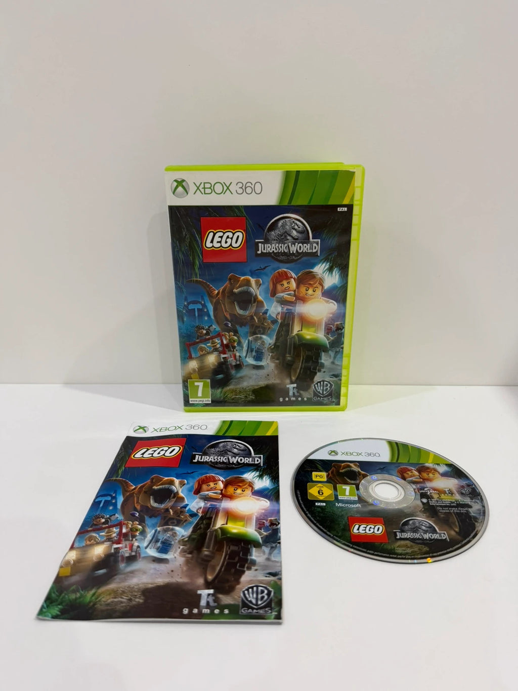 Lego Jurassic World video game for Xbox 360 with case, disc, and manual included.