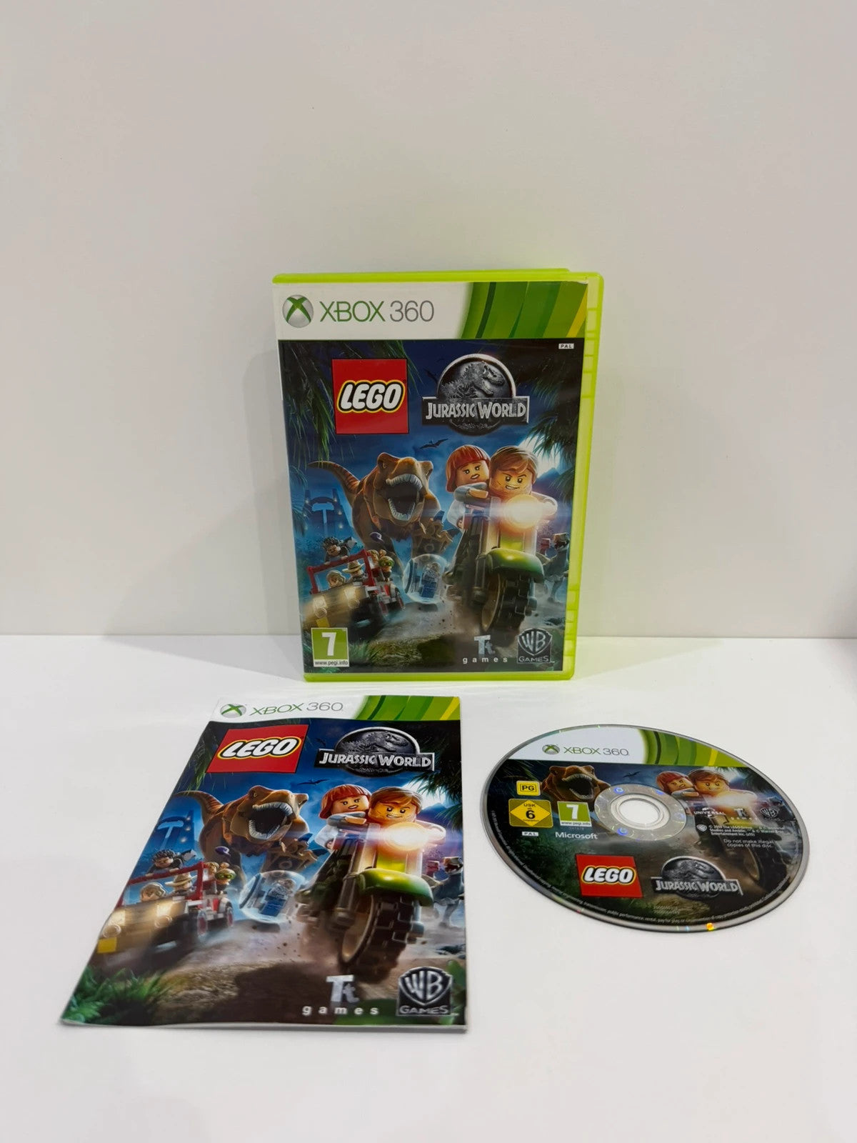 Lego Jurassic World video game for Xbox 360 with case, disc, and manual included.