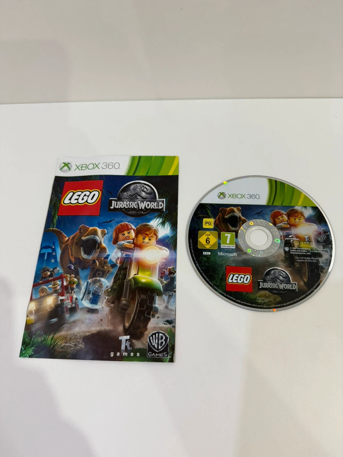 Lego Jurassic World video game for Xbox 360 with case, disc, and manual included.