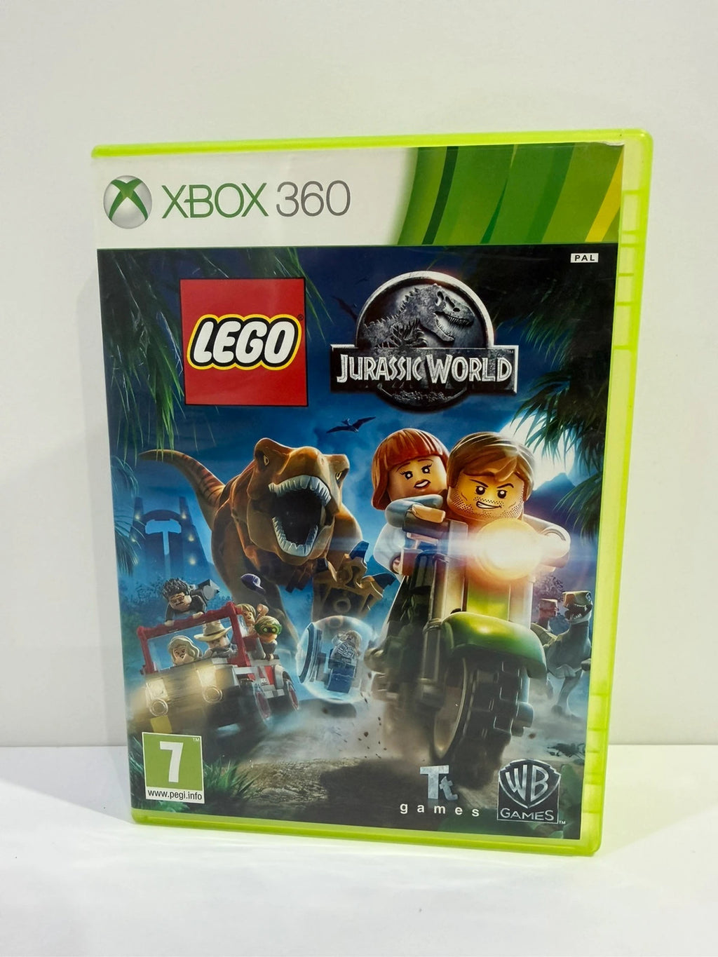 Lego Jurassic World video game for Xbox 360 with case, disc, and manual included.