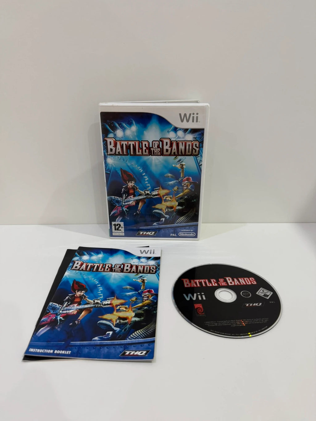 Nintendo Wii Battle of the Bands game disc with manual and case in very good condition.
