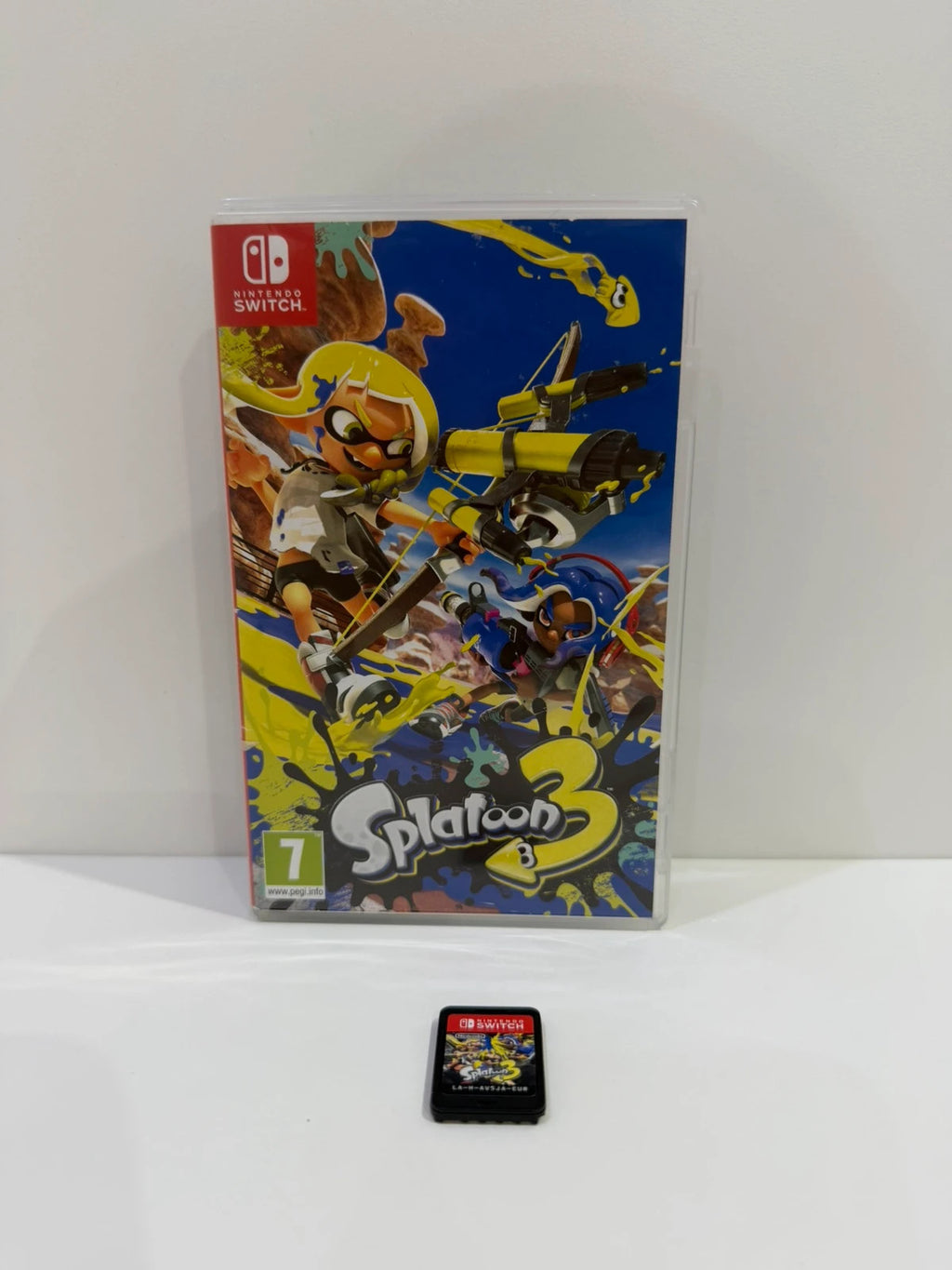 Splatoon 3 Nintendo Switch game cartridge with colorful cover art and case.