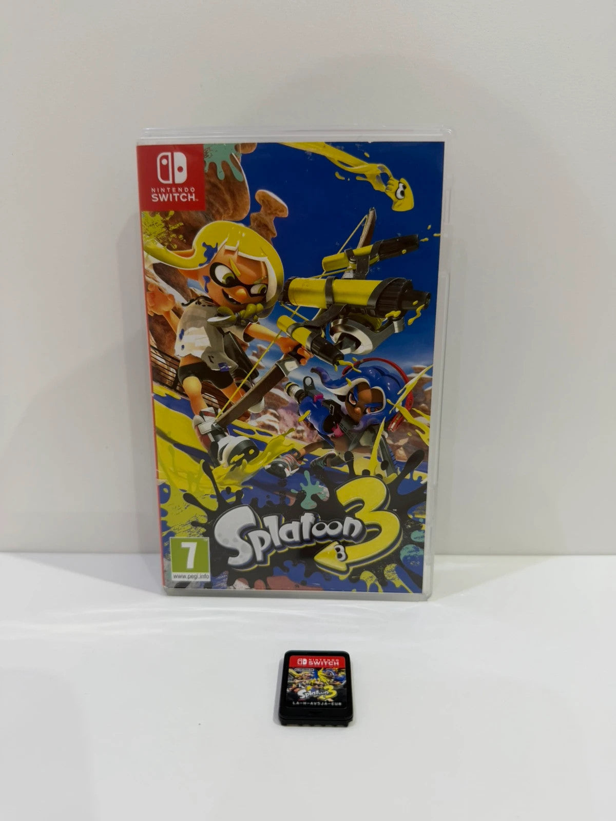 Splatoon 3 Nintendo Switch game cartridge with colorful cover art and case.