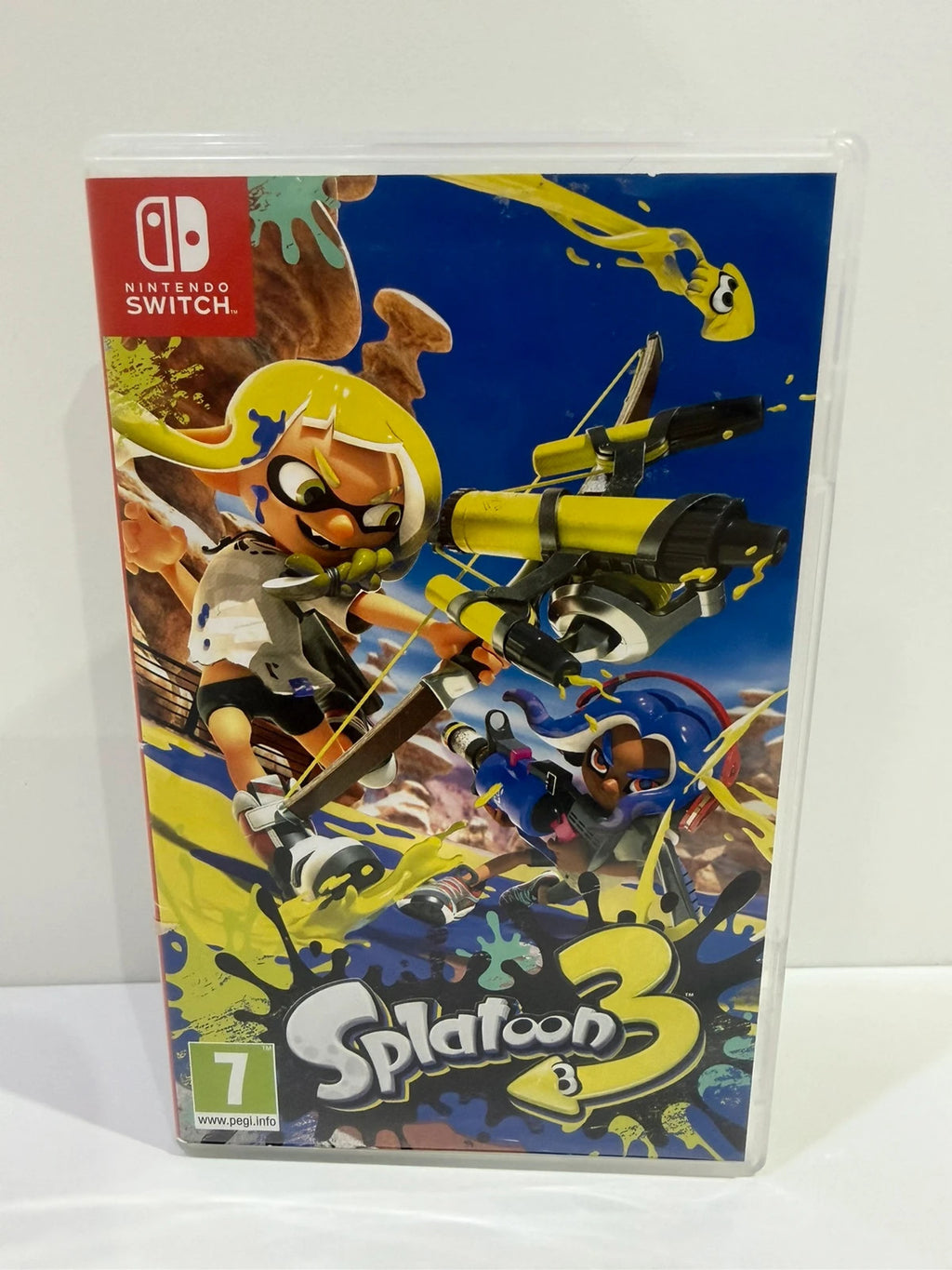 Splatoon 3 Nintendo Switch game cartridge with colorful cover art and case.