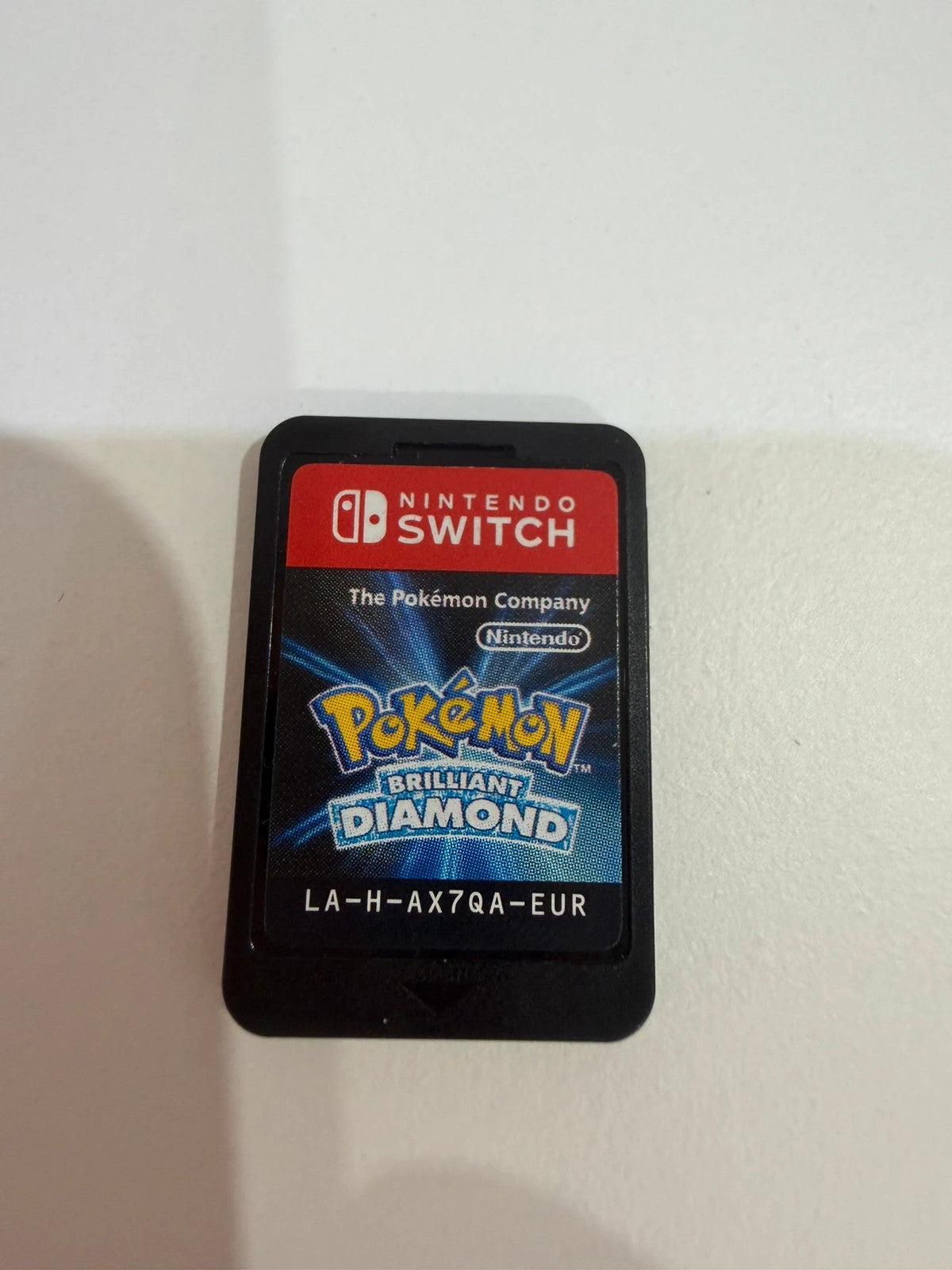 Pokémon Brilliant Diamond Nintendo Switch game cartridge with vibrant artwork and logo.