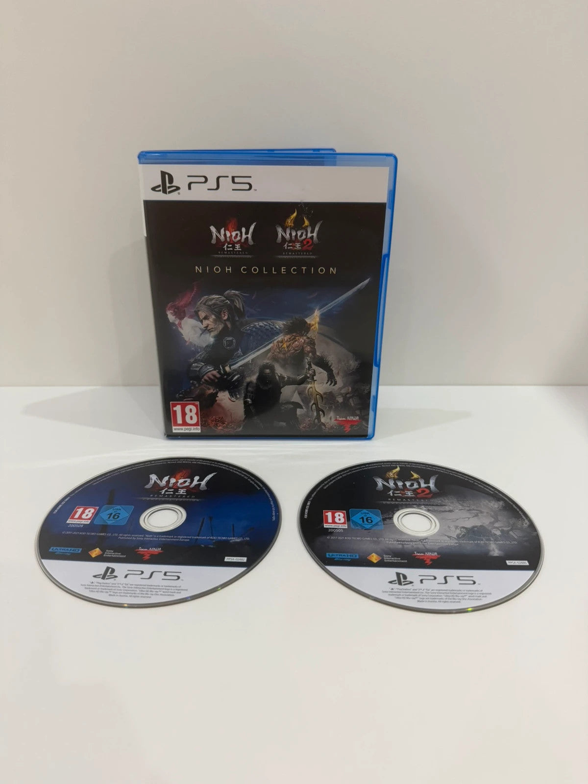 The Nioh Collection PS5 game case with cover art and two discs.