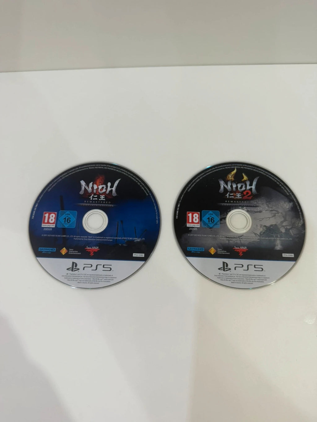 The Nioh Collection PS5 game case with cover art and two discs.