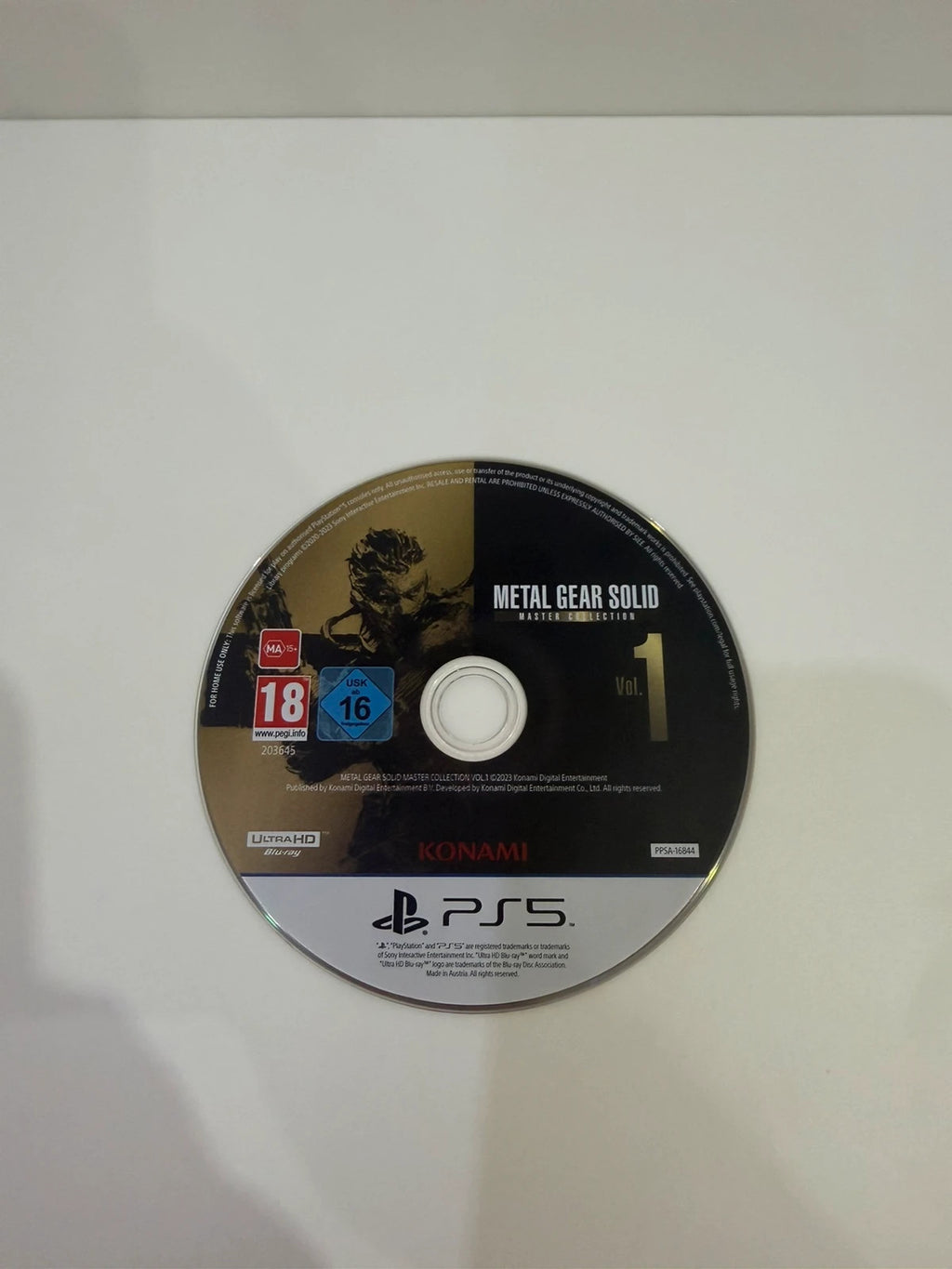 Metal Gear Solid Master Collection Volume 1 PS5 game case with disc and cover art.
