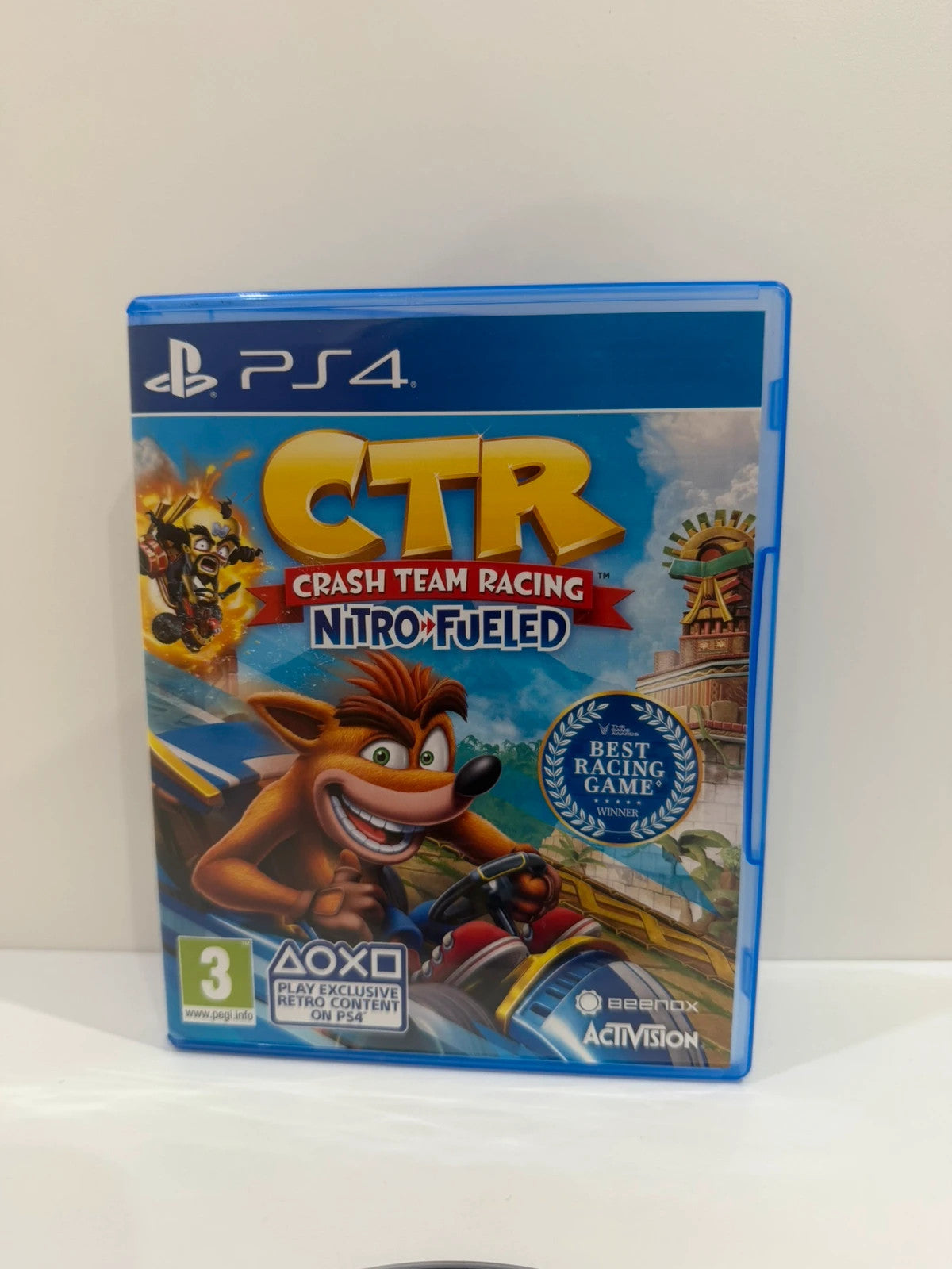 Crash Team Racing Nitro-Fueled PS4 game disc and case with colorful cover art.