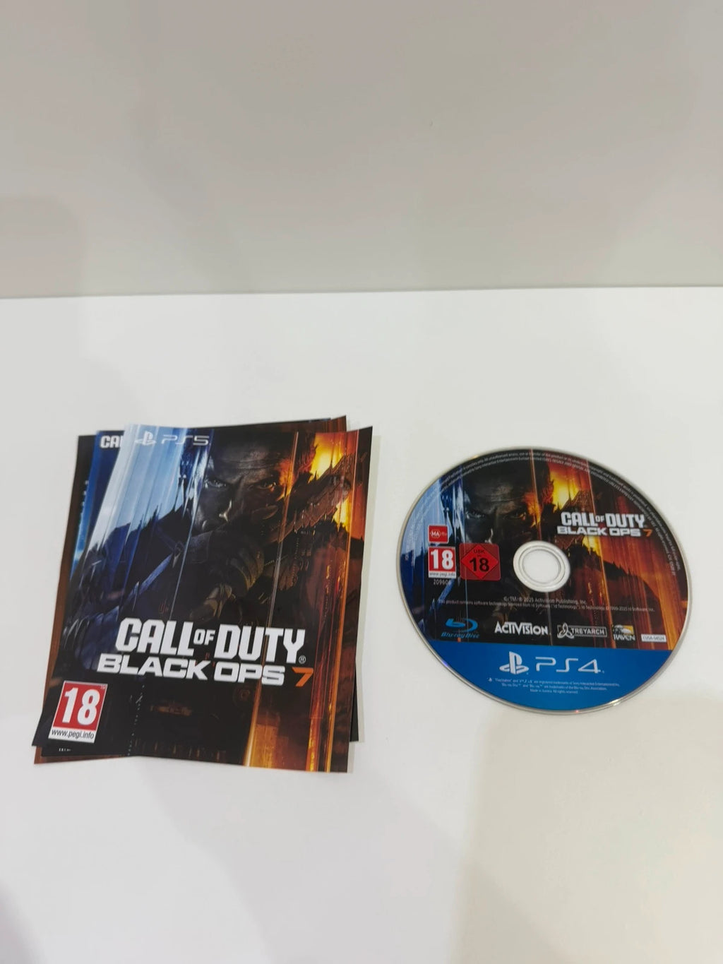 Call of Duty black PS4 game disc and case with cover art.